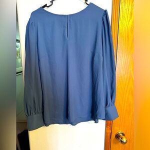 New.  Beautiful blue.  A little too small for me.  😝